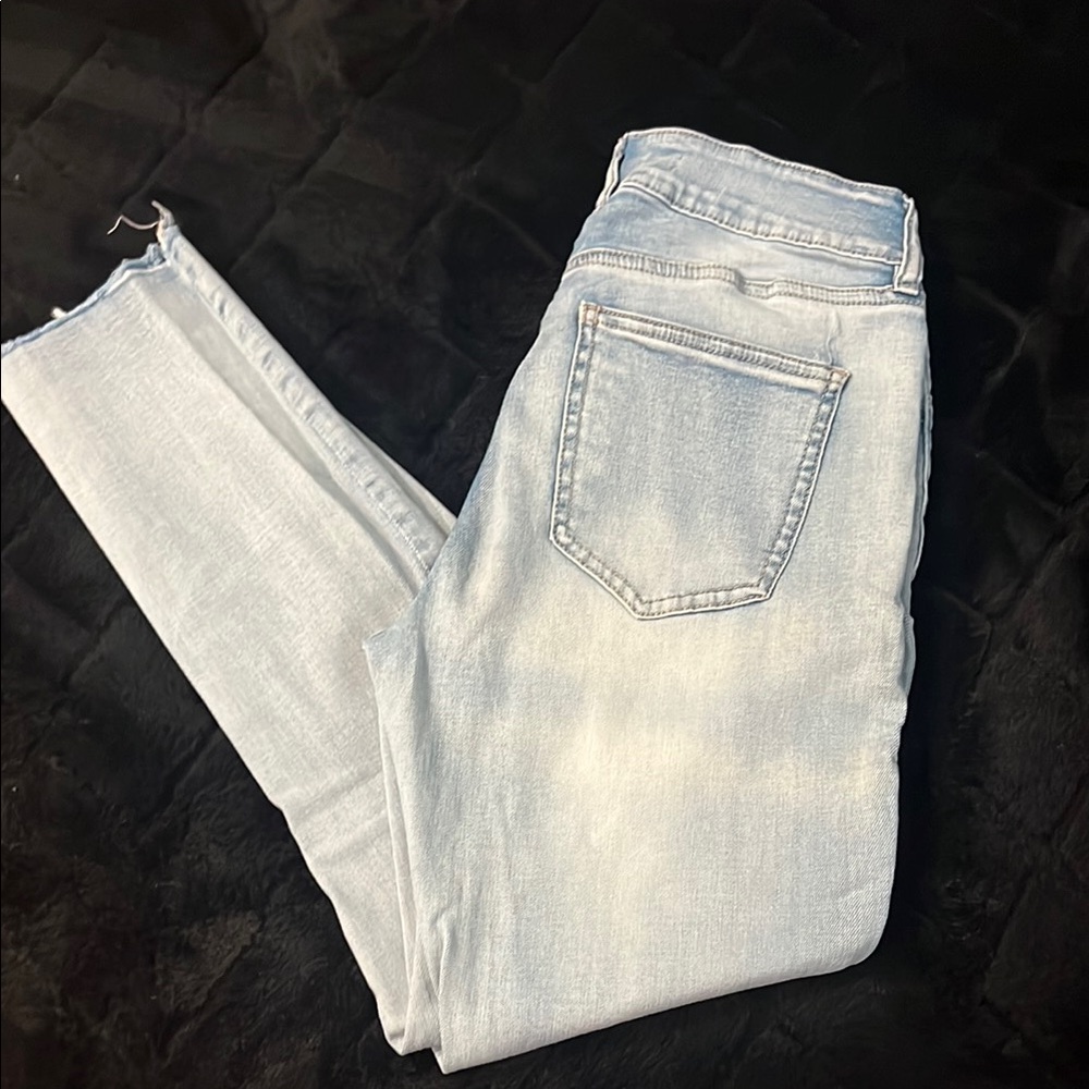 Blue Skinny Jeans with Distressed Details